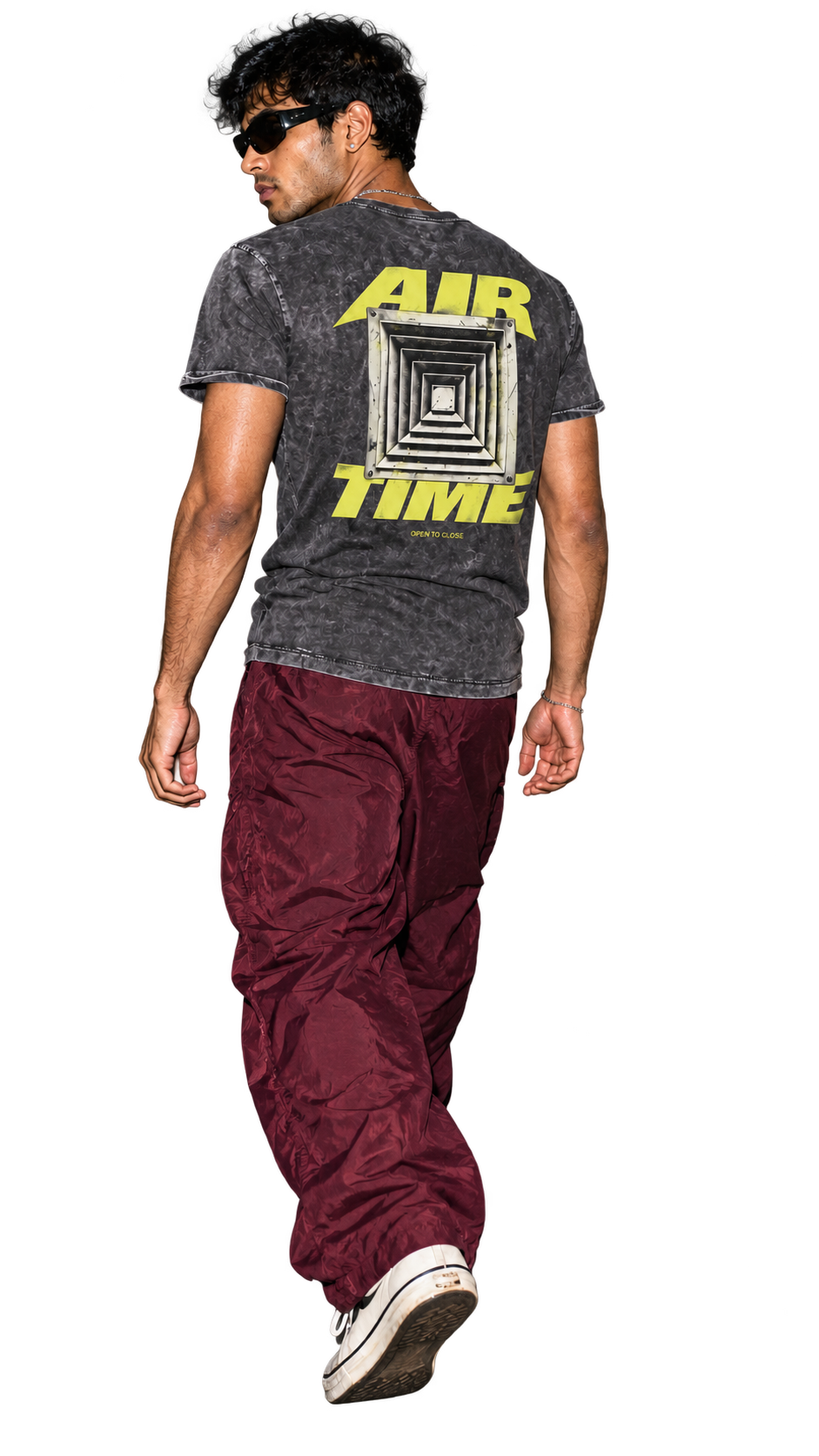 Air Time Tee in washed black denim worn by a model, back view, studio