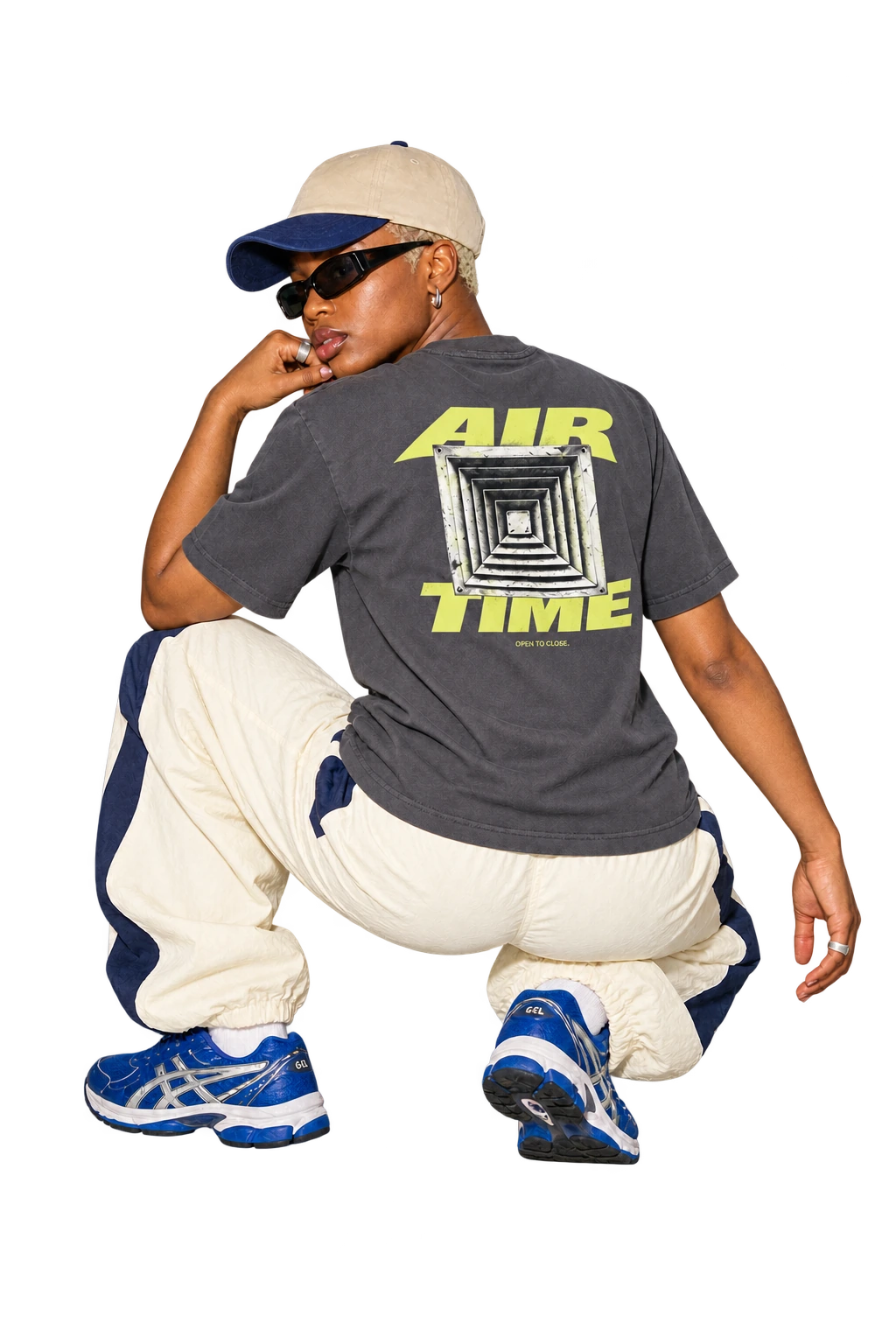 Air Time Tee worn by a model, back view, studio