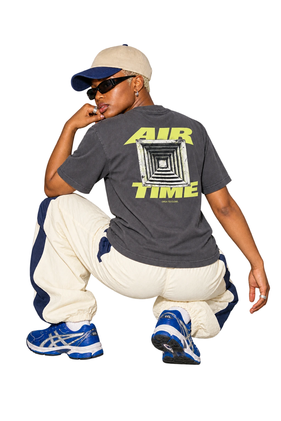 Air Time Tee worn by a model, back view, studio
