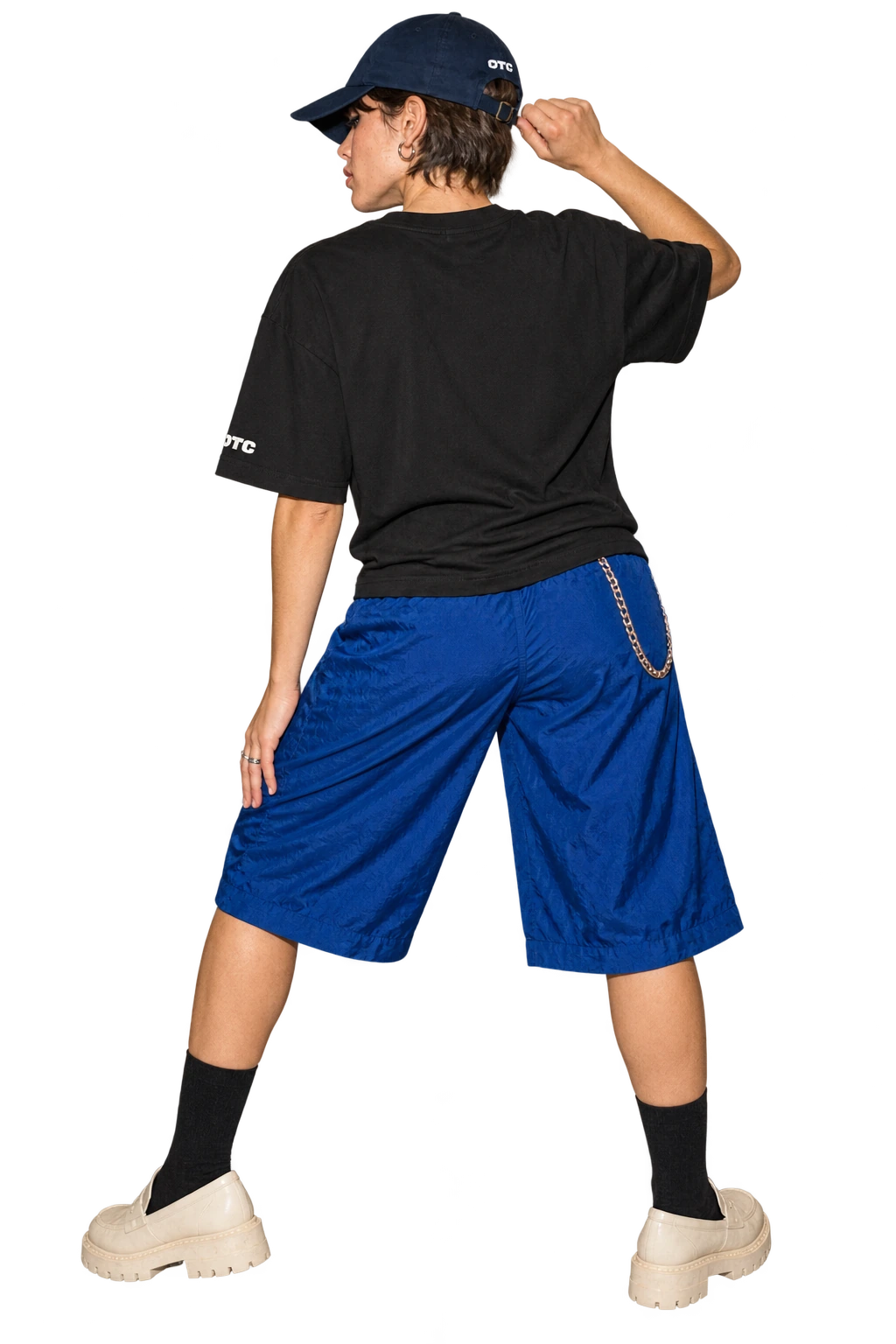 Last Ride Club Boxy Tee worn by a model, back view, studio
