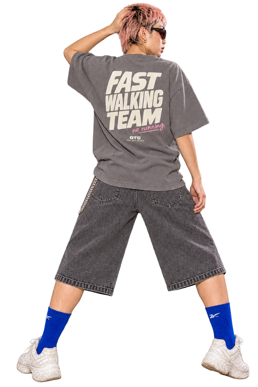 Fast Walking Team Oversized Tee worn by a model, back view, studio