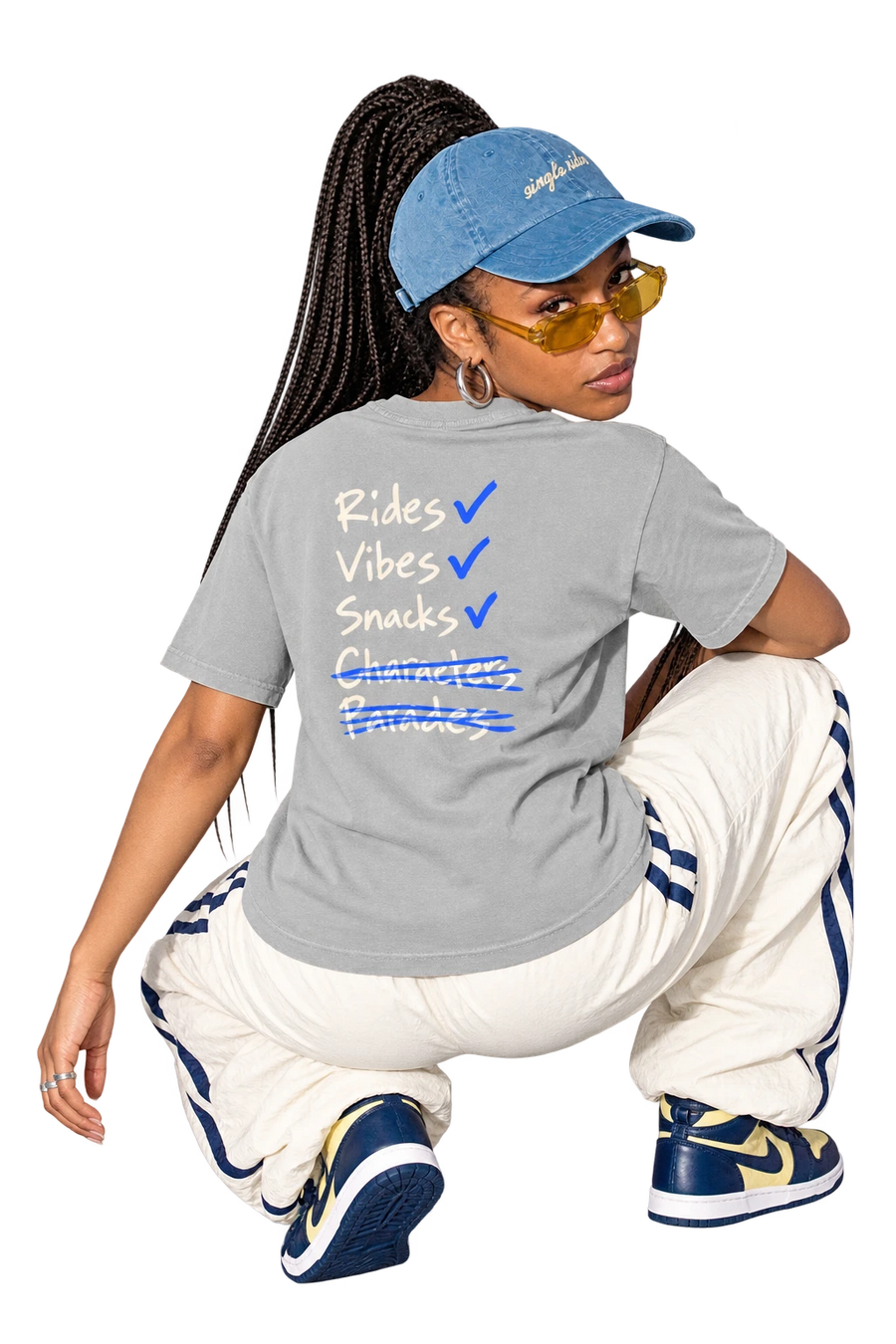 Rides, Vibes & Snacks tee worn by a model, back view, studio