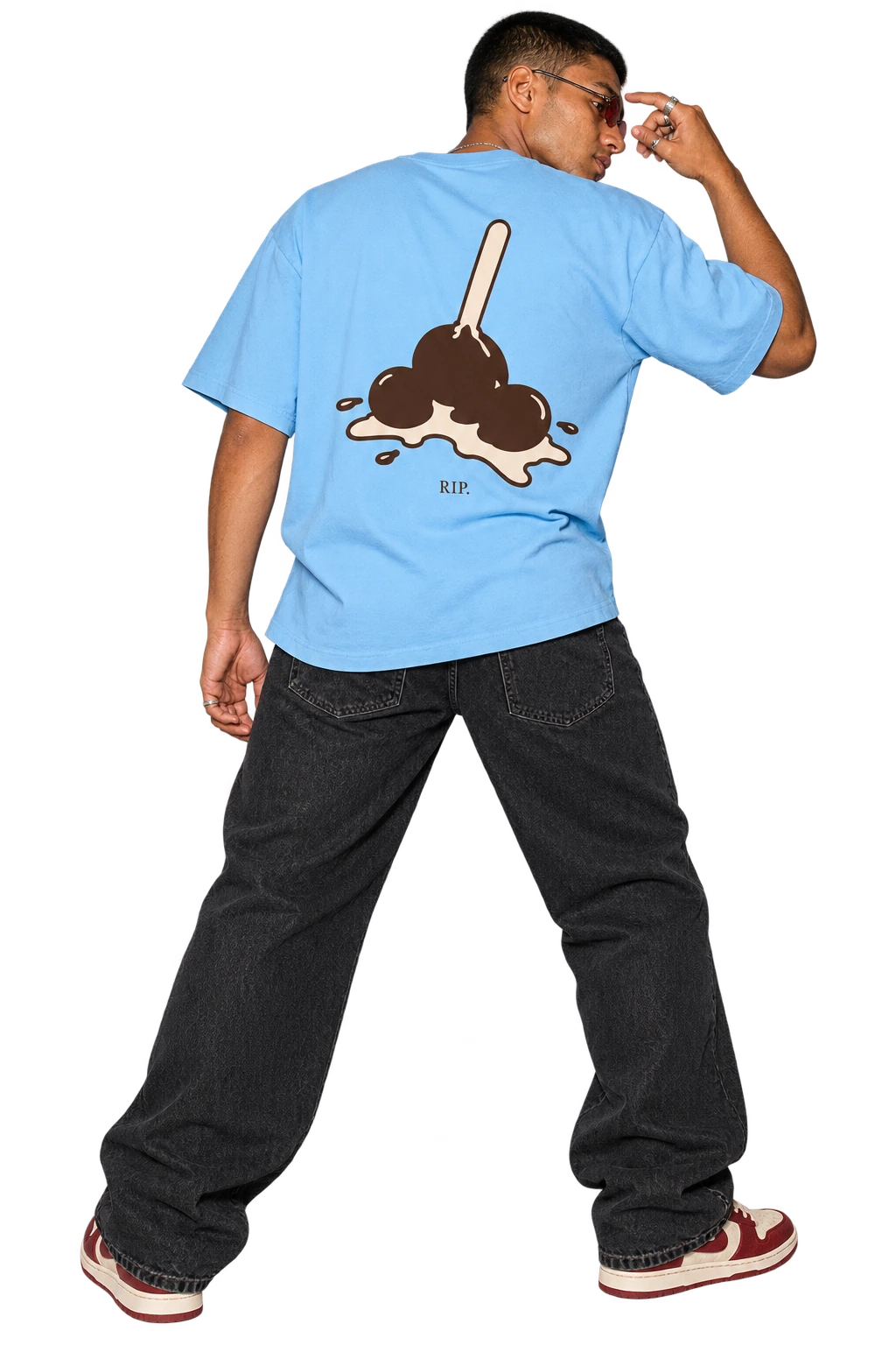 RIP Ice Cream tee worn by a model, back view, studio