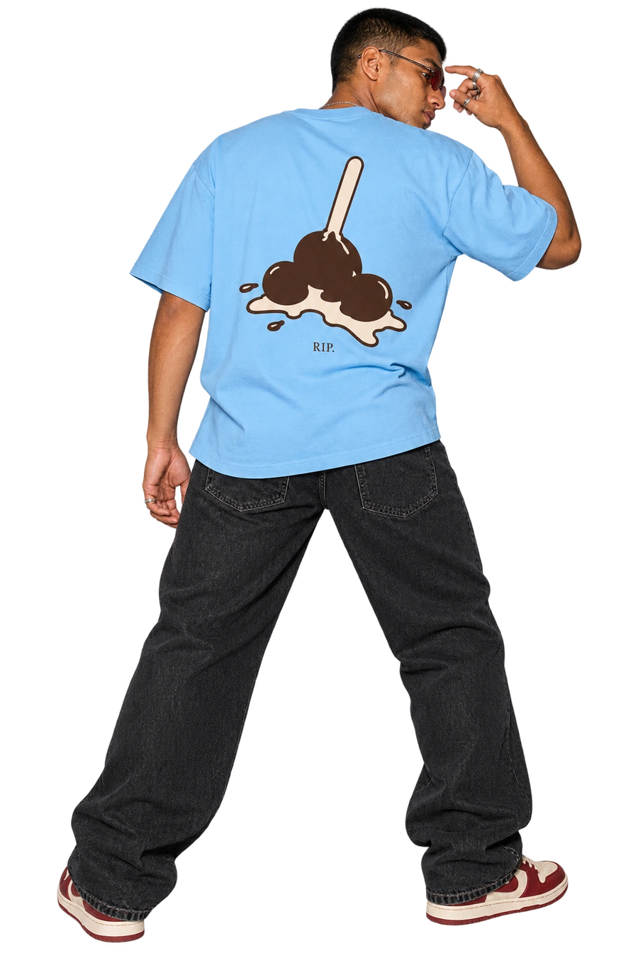 RIP Ice Cream tee worn by a model, back view, studio