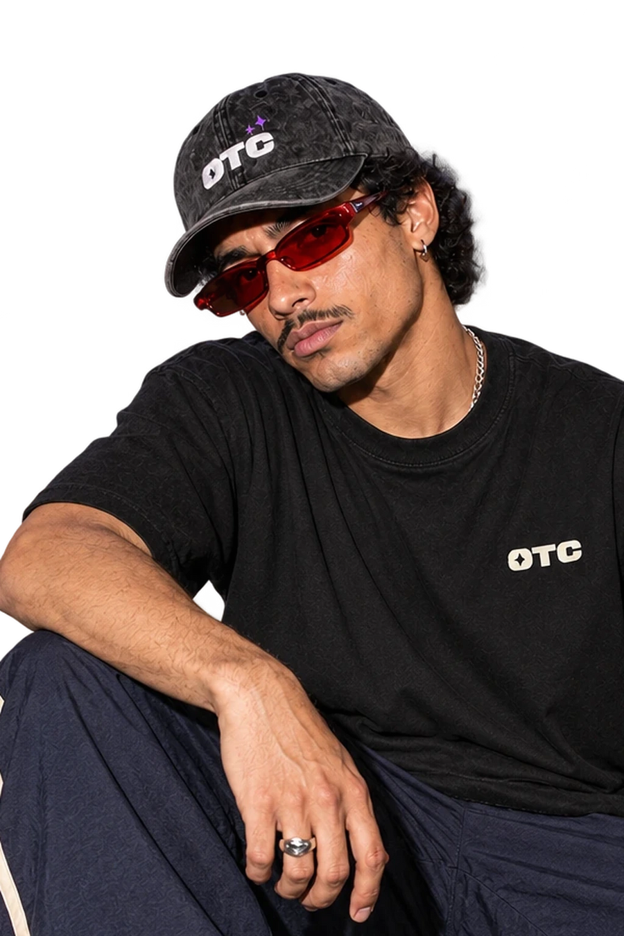 Starry Night Cap worn by a model, close-up, studio
